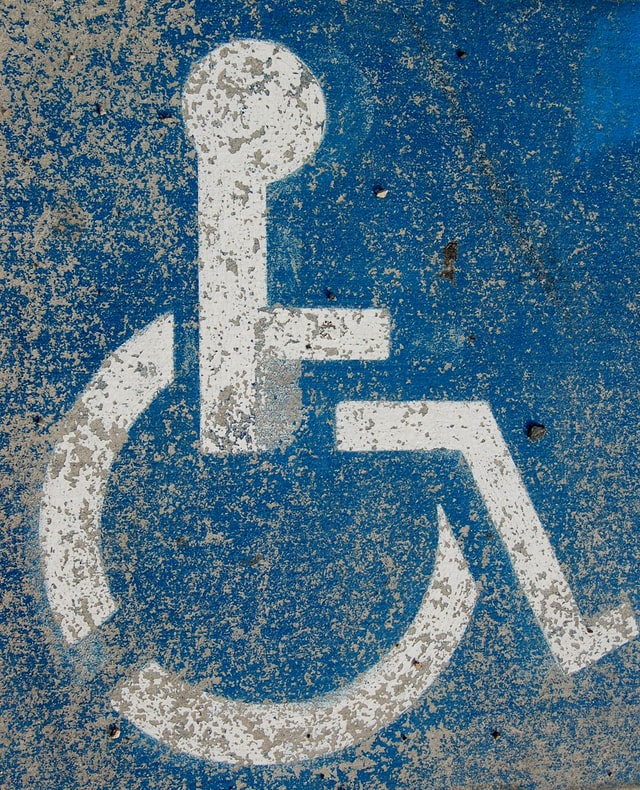Logo bleu fauteuil roulant